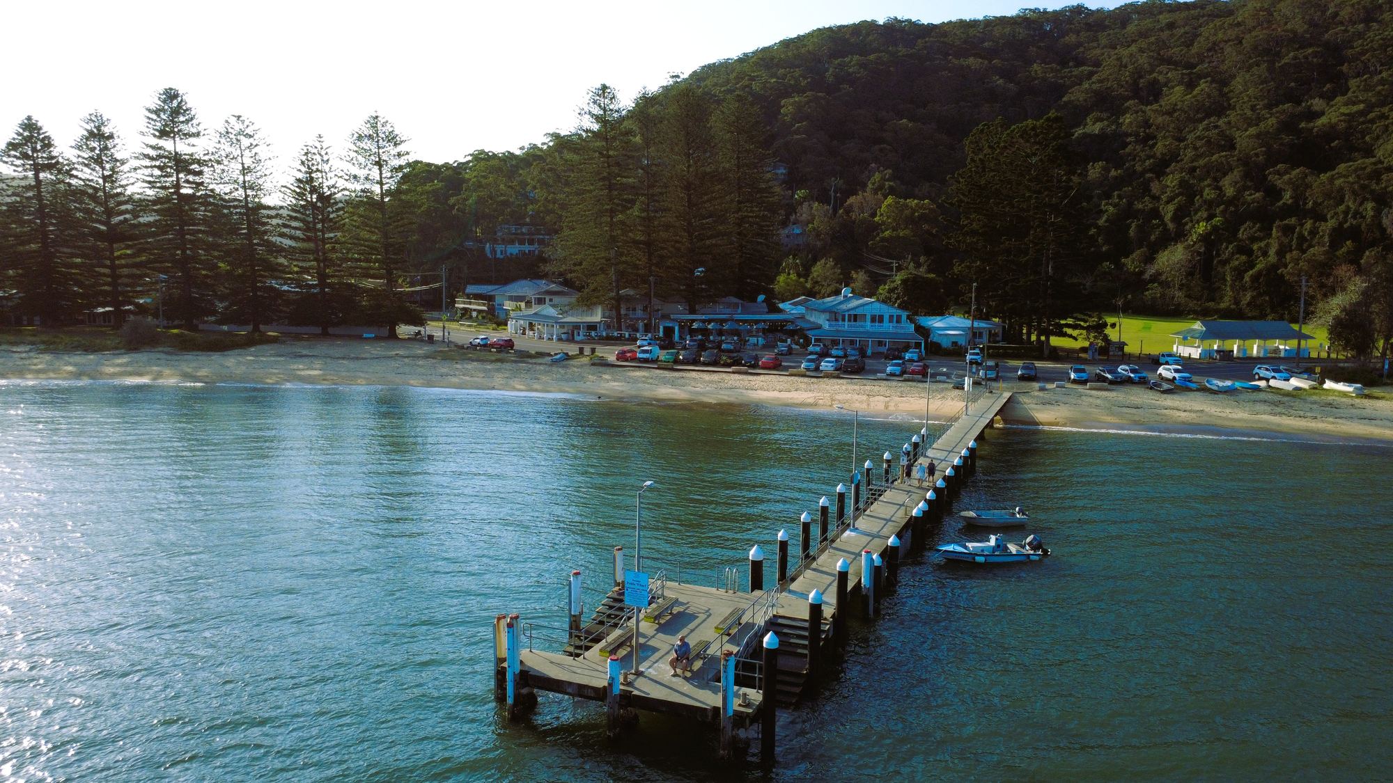 Patonga Wharf reaching into the bay at golden hour